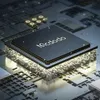 A close-up, stylized view of a computer chip on a circuit board, with the brand name 'Mcdodo' visible on the chip. Anteprima dell’immagine prodotto