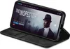 A smartphone in a black flip case is displayed at an angle, showing a movie streaming interface on its screen. Produktbild-Vorschau