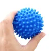 A hand holding a blue spiky ball. Anteprima dell’immagine prodotto