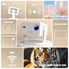A collage of images showcasing a mini projector and its features, along with a tiger image. Produktbild-Vorschau