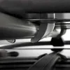 Close-up view of a metal latch mechanism on a roof box. Produktbild-Vorschau