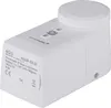 A white electronic device with buttons and text labels, likely a smart home device. Náhľad obrázku produktu