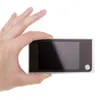 A hand is holding a digital peephole viewer. Produktbild-Vorschau