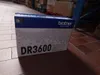 A Brother DR3600 drum unit box in a warehouse setting. Náhled obrázku produktu