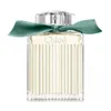 A product shot of a Chloé perfume bottle with a green ribbon. Anteprima dell’immagine prodotto