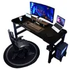 A gaming desk setup with a computer, monitor, laptop, and chair. Podgląd zdjęcia produktu