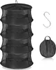 A black, multi-tiered drying rack for herbs, along with an S-hook and a folded carrying bag, displayed against a white background. Podgląd zdjęcia produktu