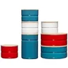 A collection of ceramic canisters with wooden lids, arranged in a studio setting against a white background. Anteprima dell’immagine prodotto