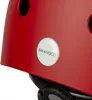 Close-up of a red helmet with a white circular logo. Produktbild-Vorschau