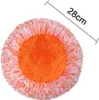 A round, fluffy mop head with orange and white fibers, with a measurement line indicating 28cm. Náhled obrázku produktu