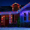 A house decorated with colorful LED Christmas lights at night. Produktbild-Vorschau