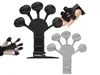 A product shot of hand exercisers in black and gray, with one black exerciser shown on a hand. Náhled obrázku produktu