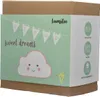 The image shows the product packaging for a night light. The packaging is a cardboard box with a printed sleeve featuring a mint green background, a cloud illustration, and text. Voir les images du produit