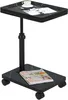 A black C-shaped side table with a marble-like pattern is shown against a white background. The table has a height-adjustable pole and wheels at the base. A magazine is placed on the base, and a cup of coffee and a magazine are on the tabletop. Produktbild-Vorschau