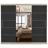 A sliding door wardrobe with a mirrored center section reflecting a bedroom interior. Produktbild-Vorschau