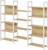 A multi-section bookshelf with wooden shelves and white metal frames. Produktbild-Vorschau