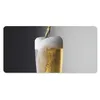 MuchoWow® Schreibtischunterlage Leckeres Bier auf schwarzem Produktbild-Vorschau 1