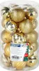 A clear, well-lit image of a clear plastic container filled with gold-colored Christmas baubles. Náhľad obrázku produktu