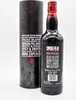 A bottle of Smokehead Sherry Cask Blast Scotch Whisky and its cylindrical packaging are displayed against a white background. Produktbild-Vorschau