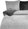A close-up view of a bedding set, showing the texture and colors of the fabric. Náhled obrázku produktu