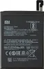 A black smartphone battery with labels and markings. Produktbild-Vorschau