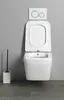 A wall-mounted toilet with the lid open, next to a toilet brush holder. Anteprima dell’immagine prodotto