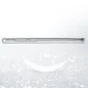 A side view of a clear phone case with glitter accents, placed on a sparkling, reflective surface. Produktbild-Vorschau