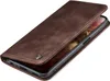 A brown leather flip case for a smartphone is shown against a white background. Produktbild-Vorschau