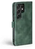 A green flip case for a Samsung Galaxy S22 Ultra phone, shown from the side with the camera lenses visible. Produktbild-Vorschau