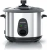 A silver electric rice cooker with a glass lid and black accents is shown on a white reflective surface. Produktbild-Vorschau