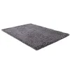 A gray shaggy rug is shown on a white background. Náhled obrázku produktu