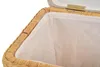 A close-up view of the inside of a wicker laundry basket with a white fabric lining. Produktbild-Vorschau