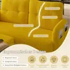 A close-up view of a yellow corduroy sofa, highlighting its ergonomic design features with text overlays and diagrams. Produktbild-Vorschau