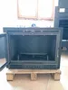 An empty fireplace insert is shown on a wooden pallet. Náhled obrázku produktu