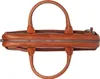 A top-down view of a brown leather briefcase. Produktbild-Vorschau