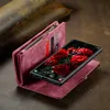 A red leather wallet case for a smartphone is shown open, with the smartphone displaying a picture of red roses. The wallet has slots for cards and a zippered compartment. The background is a textured brown leather. Produktbild-Vorschau