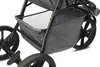 A close-up view of the storage basket and wheels of a stroller. Náhľad obrázku produktu