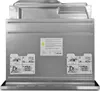 The back of a stainless steel appliance with instructional diagrams. Produktbild-Vorschau