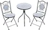 A black metal bistro set with a round ceramic mosaic table and two folding chairs, all with blue and white patterned cushions and table top. Náhled obrázku produktu