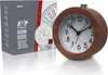 A wooden alarm clock is shown next to its packaging. Náhľad obrázku produktu