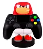 A figurine of Sonic the Hedgehog's character Knuckles holding a video game controller. Podgląd zdjęcia produktu