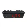 A black digital alarm clock with a red LED display is shown against a white background. Náhľad obrázku produktu