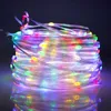 A coiled string of colorful LED lights against a dark background. Produktbild-Vorschau