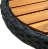 A close-up view of the edge of a round table, showing the woven black poly rattan border and the wooden slats of the tabletop. Náhľad obrázku produktu