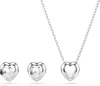 A silver heart-shaped necklace and matching earrings are displayed on a white background. Produktbild-Vorschau