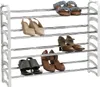 A multi-tiered shoe rack with various types of shoes on each shelf. Produktbild-Vorschau