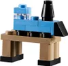 A small LEGO train model on a brown platform. Produktbild-Vorschau