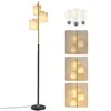 A floor lamp with three fabric shades and three light bulbs are displayed. Produktbild-Vorschau