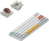A white mechanical keyboard with different colored keycaps and two mechanical switches are displayed against a white background. Produktbild-Vorschau