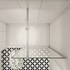 A top-down view of a shower enclosure with patterned tiles. Produktbild-Vorschau